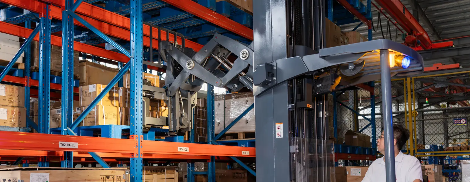 MiMA Reach truck working at a warehouse
