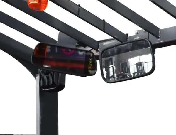 Retractable mast and small turning radius reduce right-angle stacking space.